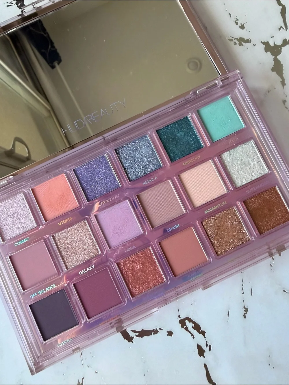 HUDA BEAUTY Mercury Retrograde Eyeshadow Palette - Purple, Pink, Teal, Gold